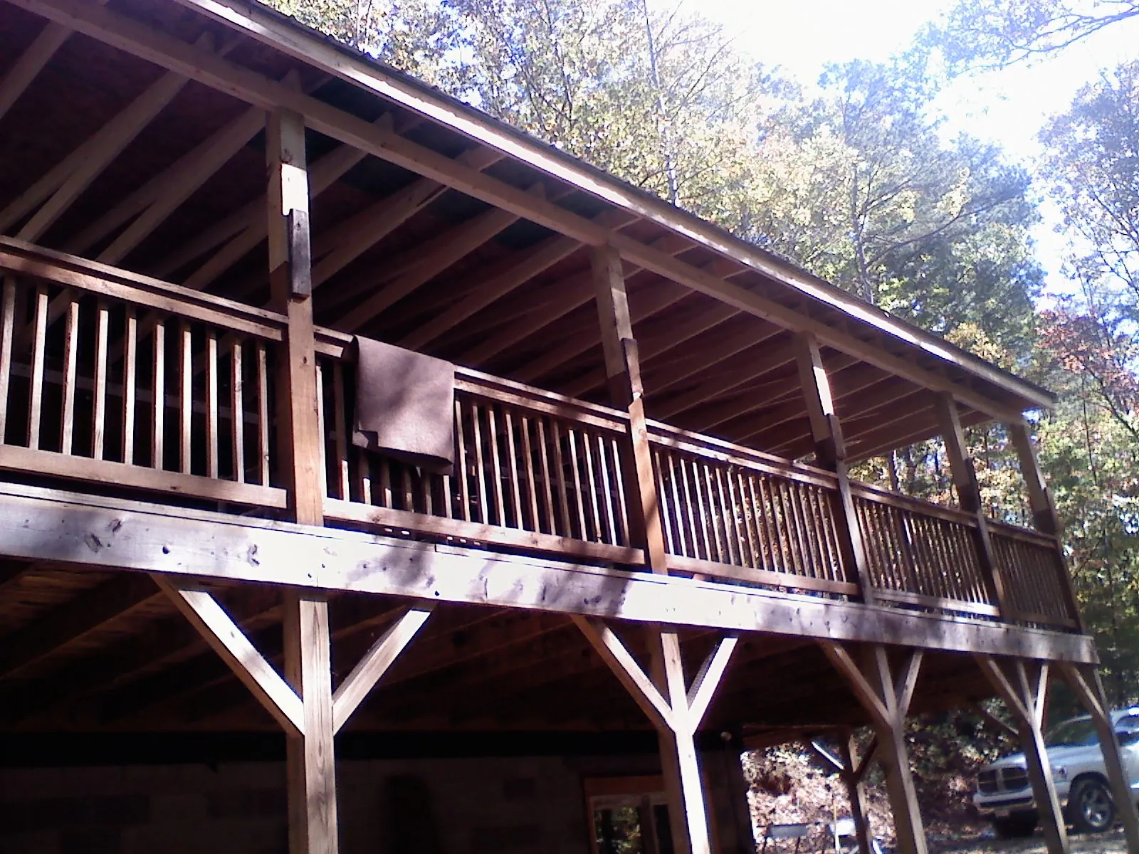 Timber framing under a new elevated porch and deck — Roof Leak Repair in Holmdel by Roofing Brothers
